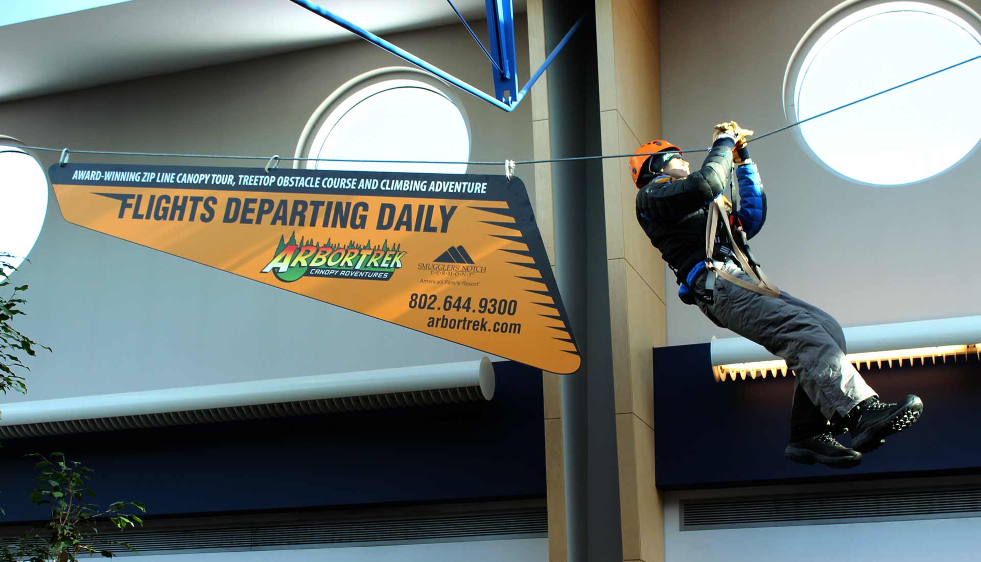 ArborTrek Canopy Adventures display at Burlington International Airport
